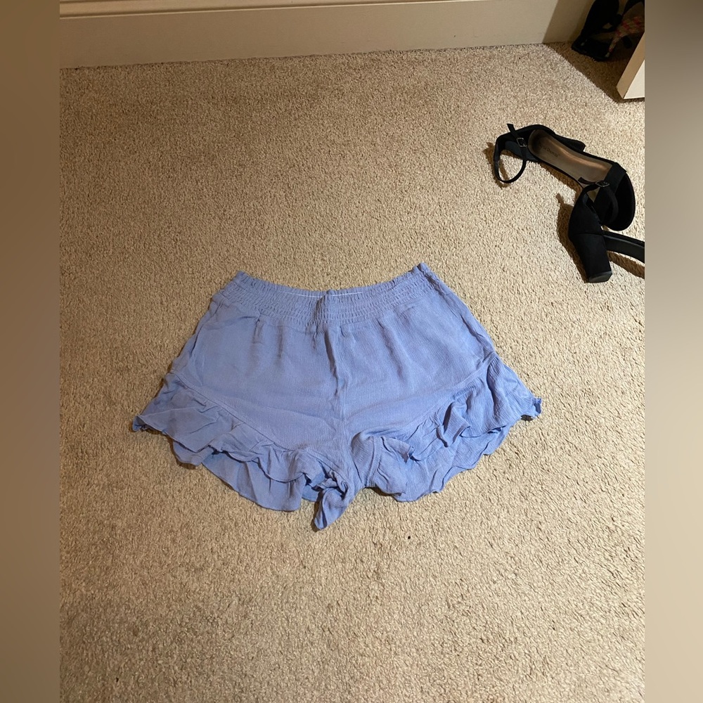 Blue shorts with ruffles